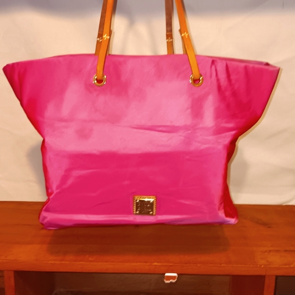 Dooney & Bourke Handbags - Bright pink Dooney and Burke Purse